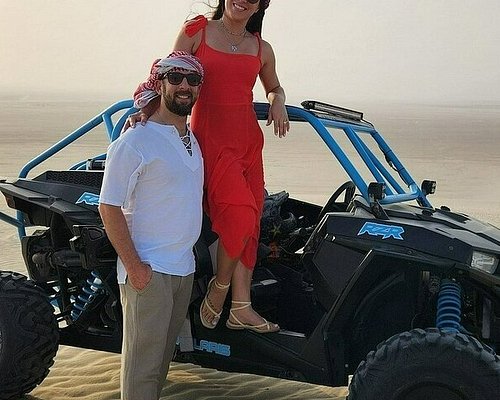 Doha ATV Quad Buggy Dune Bashing Camel Ride and Sandboarding